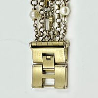 Guess W0140L2 Ladies Silk Silver Pearl Charm Watch Gold Tone Dial