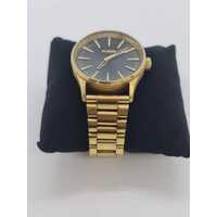 Nixon The Sentry 38 SS A450 Stainless Steel Gold Band Black Size Matters Watch