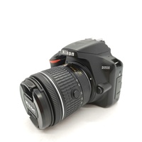Nikon D3500 DSLR Camera with 18-55mm Lens with Battery Charger and Case