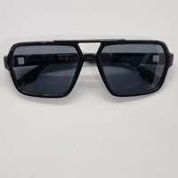 Prada Linea Rossa SPS01X Polarised Sunglasses Black Frame and Dark Grey Lenses