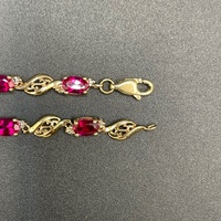 Ladies 9ct Yellow Gold Fancy Link Red Stone Bracelet