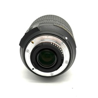 Nikon AF-S DX NIKKOR 18-140mm f/3.5-5.6G ED VR Zoom Lens and Front Cap