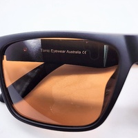 Tonic Outback 02 Polarised Photochromic Copper Sunglasses Black with Case