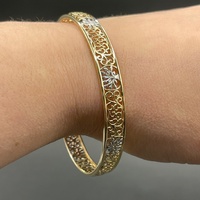 Ladies 9ct Two Tone Round Pattern Bangle