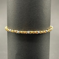 Child's 18ct Three Tone Gold Cuff Bangle