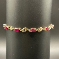Ladies 9ct Yellow Gold Fancy Link Red Stone Bracelet