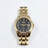 Seiko V157-0BF0 Date Display Gold Tone Stainless Steel 10Bar Solar Mens Watch