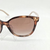 Prada PR 22ZSF 07R0A6 Ladies Sunglasses Caramel Tortoise Case 55mm