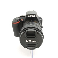 Nikon D3500 DSLR Camera with 18-55mm Lens with Battery Charger and Case