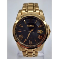 Seiko V157-0BF0 Date Display Gold Tone Stainless Steel 10Bar Solar Mens Watch
