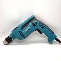 Makita HP1640 Corded Hammer Drill 680W 16mm with Handle and Drill Bits