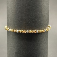 Child's 18ct Three Tone Gold Cuff Bangle