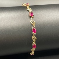 Ladies 9ct Yellow Gold Fancy Link Red Stone Bracelet