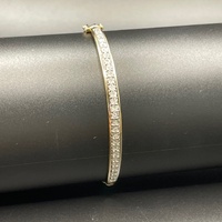 Ladies 9ct Yellow Gold Natural Diamond Oval Bangle