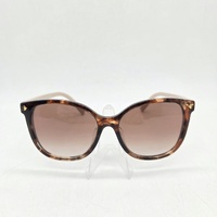 Prada PR 22ZSF 07R0A6 Ladies Sunglasses Caramel Tortoise Case 55mm