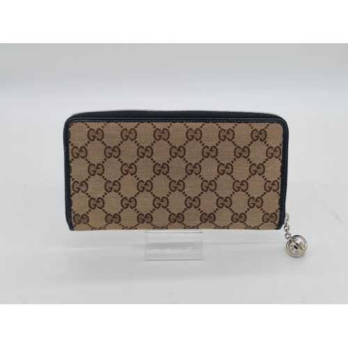 Gucci Beige/Brown GG Canvas and Leather GG Twins Zip Around Wallet (Pre-owned)
