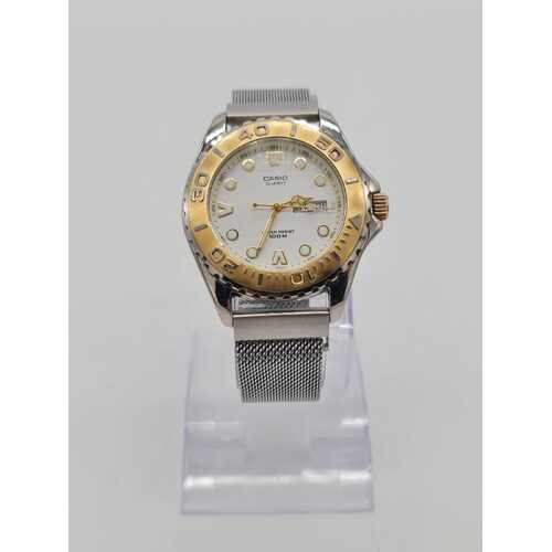 Casio 709 MTD-1017 Unisex Watch Silver Mesh Stainless Steel 100m WR