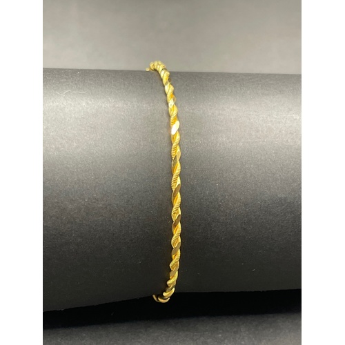 Ladies 21ct Yellow Gold Round Twist Bangle