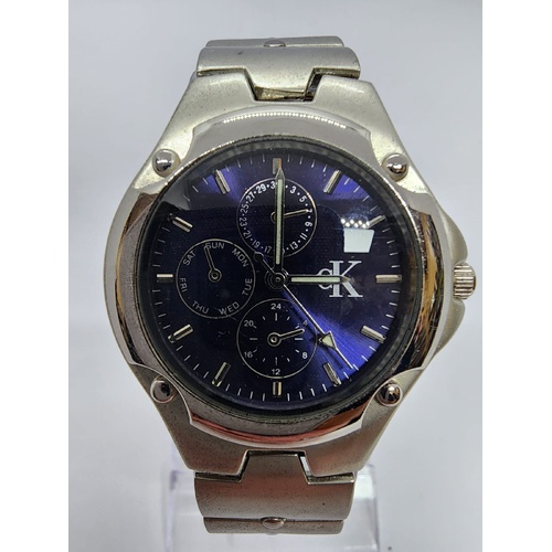 Calvin Klein CK Unisex Silver Watch Blue Dial Multi Function Display
