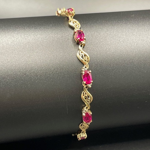 Ladies 9ct Yellow Gold Fancy Link Red Stone Bracelet