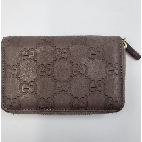 Authentic GUCCI Microguccissima Brown Leather Zip Around Wallet - 255452