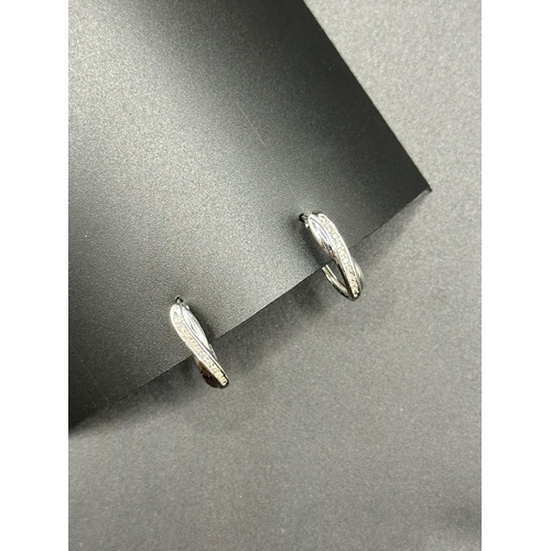 Ladies 9ct White Gold Diamond Oval Hoop Earrings