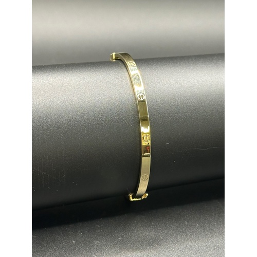 Ladies 18ct Yellow Gold Oval Hinged Bangle